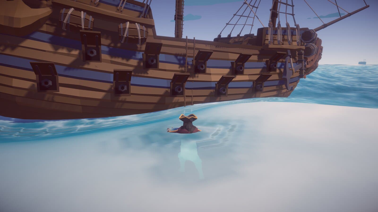 Swimming beside a large galleon